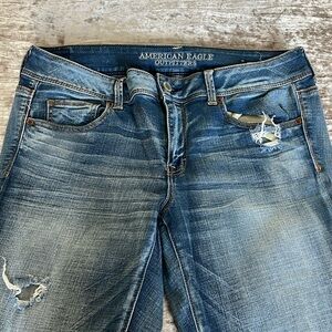 American Eagle kickboot super stretch jeans with decorative pockets. Size 14